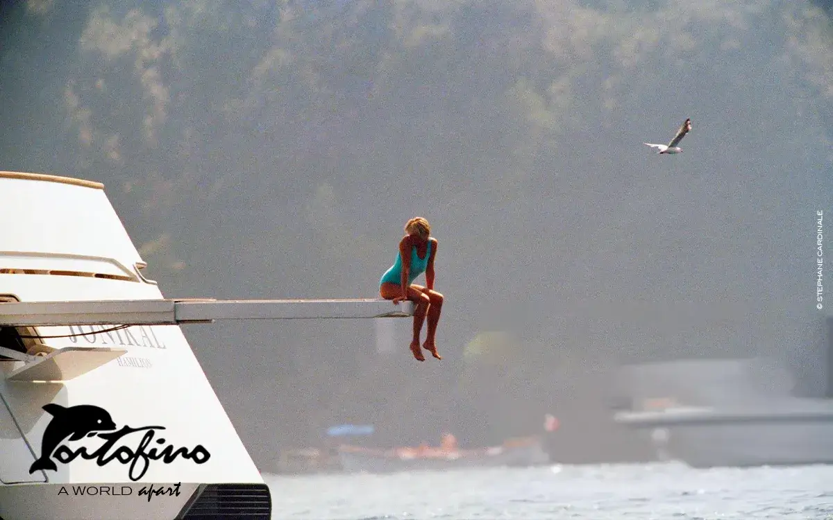 princess diana sitting on the diving board of Mohammed Al Fayed's private yacht Jonikal