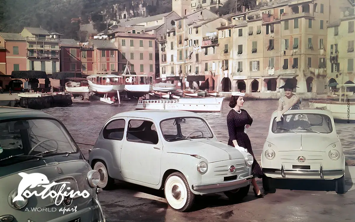 wo models posing in the port among three new Fiat 600 cars Portofino 1955 mondadori(